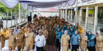Bupati Asri Ludin Tambunan melaporkan capaian 70 akseptor MOW pada Kick Off Pelayanan KB Serentak di Deli Serdang