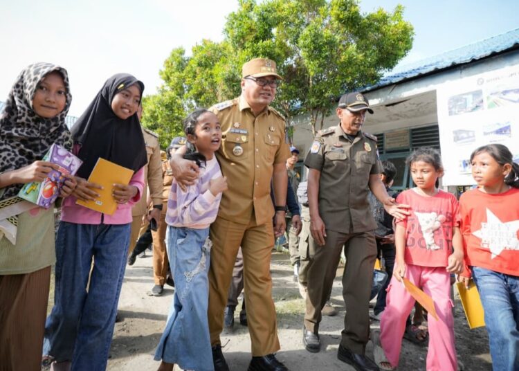 Bupati Deli Serdang dr. H. Asri Ludin Tambunan, Melakukan Peletakan Batu Pertama Rehabilitasi Dan Pembangunan Fasilitas SDN 108076 Tanjung Selamat