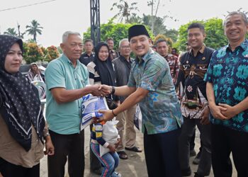 WALI KOTA TEBING TINGGI TINJAU PENYALURAN BANTUAN BERAS PREMIUM TAHAP PERTAMA