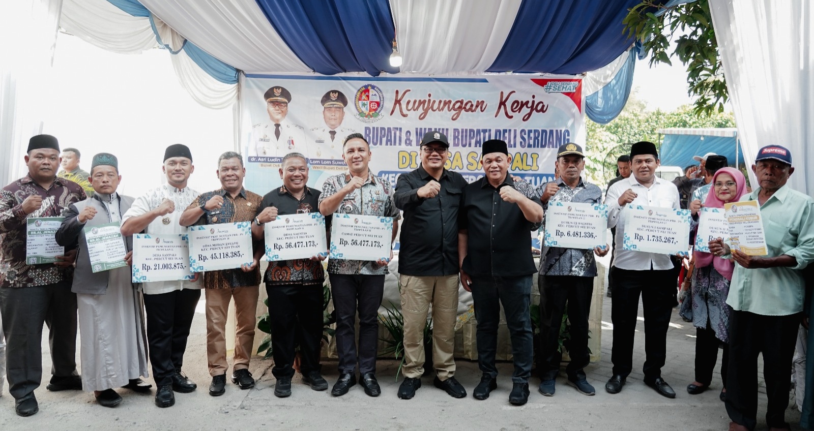 BUPATI DELI SERDANG ASRI LUDIN SERAHKAN UPAH PUNGUT PBB-P2 KEPADA APARATUR PST - IMG 20260711 182757