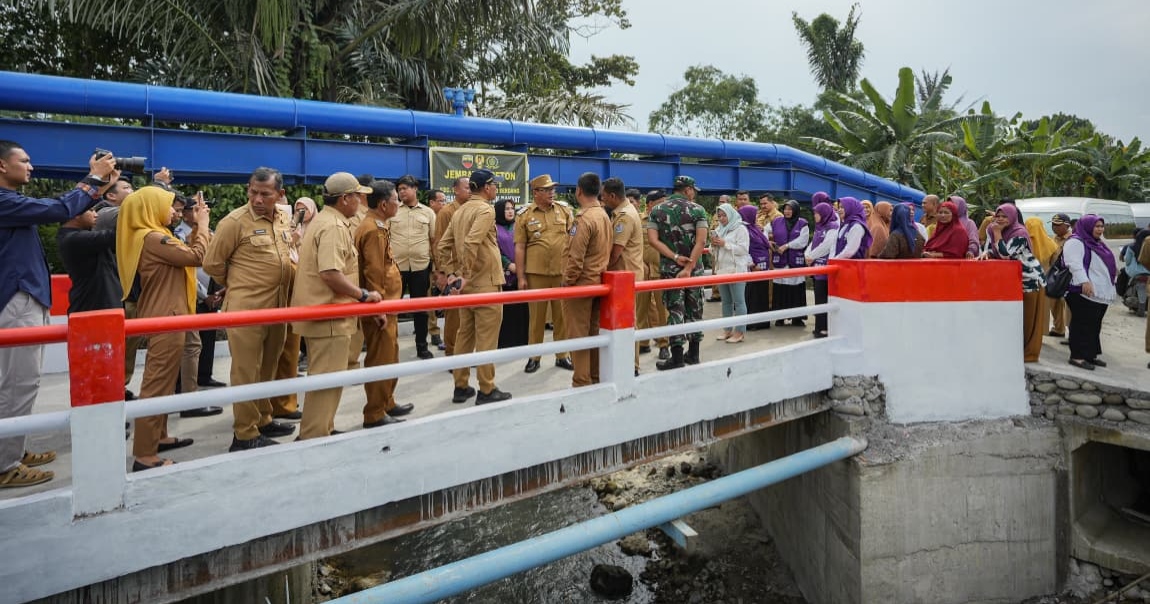 TNI Bersama Pemdes Sunggal Dan Masyarakat Bangun Jembatan Sei Krio - IMG 20260727 215659