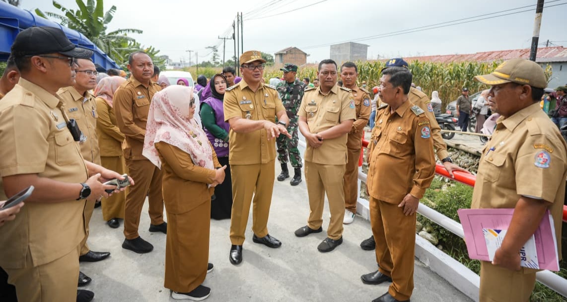 TNI Bersama Pemdes Sunggal Dan Masyarakat Bangun Jembatan Sei Krio - IMG 20260727 215712