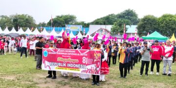 Hadiri Gebyar Akbar Desa Buntu Bedimbar, Bupati Asri Ludin Ajak Warga Ramaikan Jalan Santai